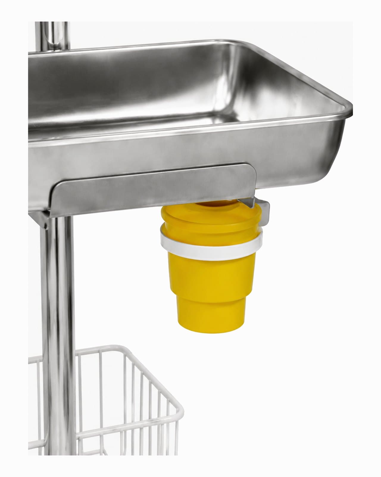 Close-up of the IVS-200 sharps-container holder mounted under the instrument tray